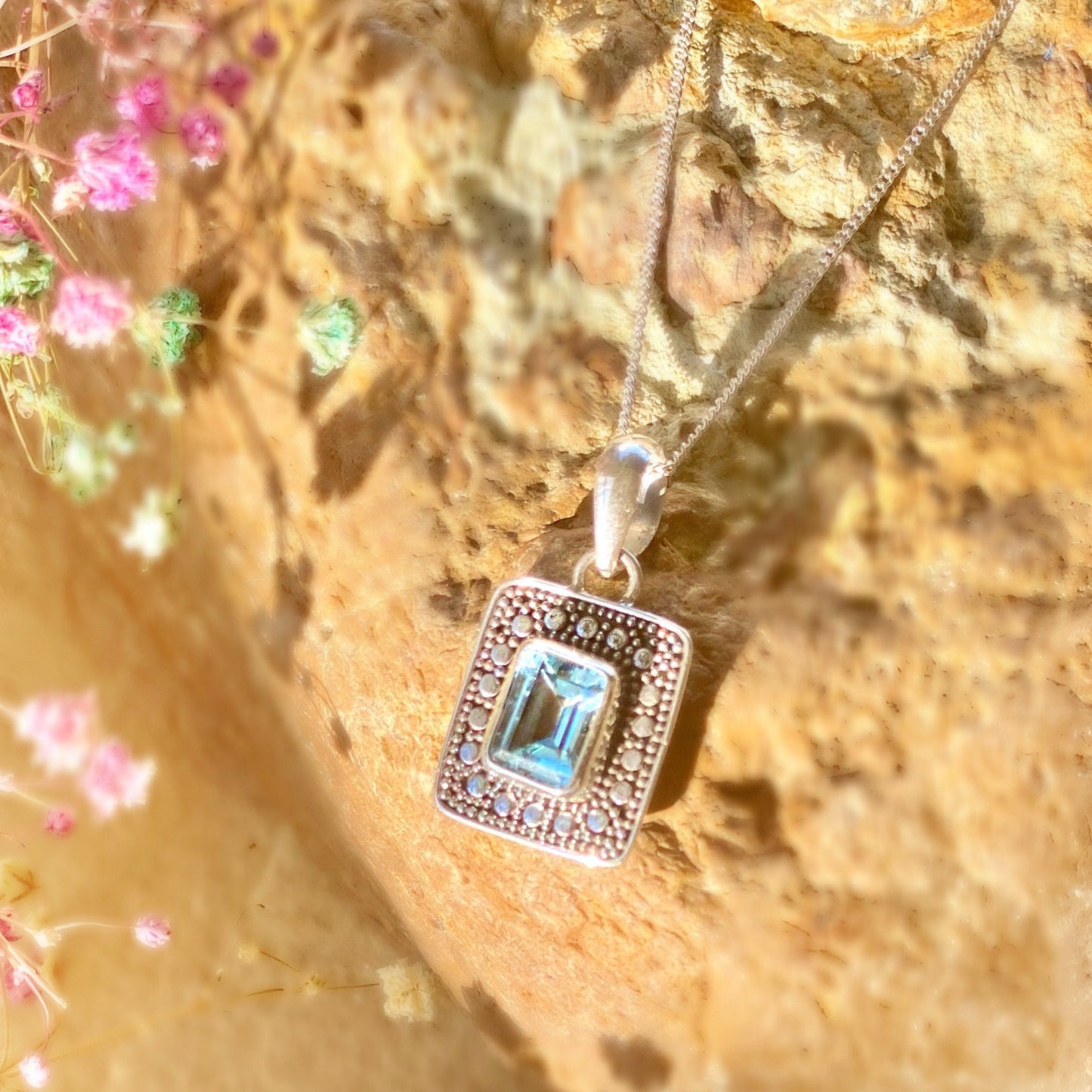 Infinite blue topaz necklace