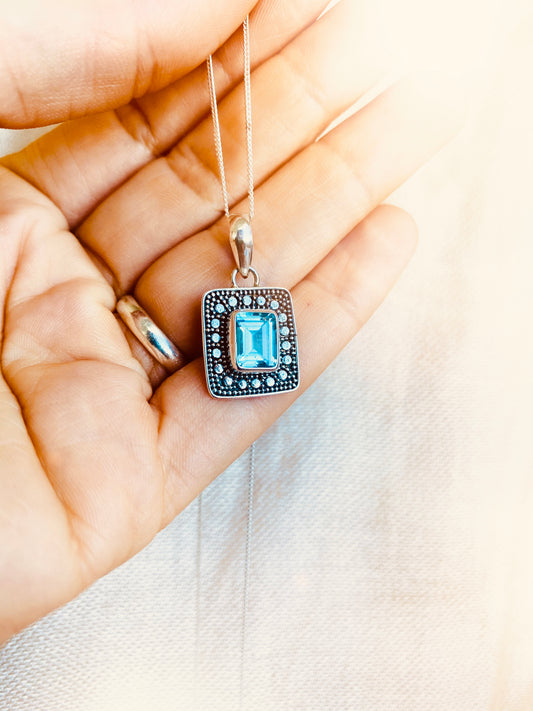 Infinite blue topaz necklace
